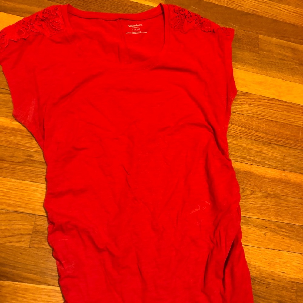Red short sleeve maternity shirt.